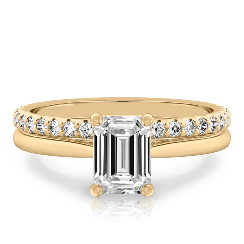 emerald cut diamond cathedral solitaire engagement ring set in yellow gold