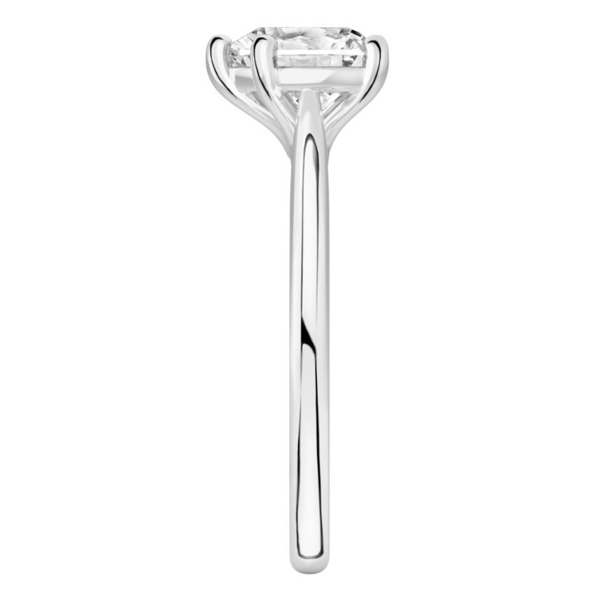 Side view of heart shape diamond cathedral solitaire engagement ring palladium