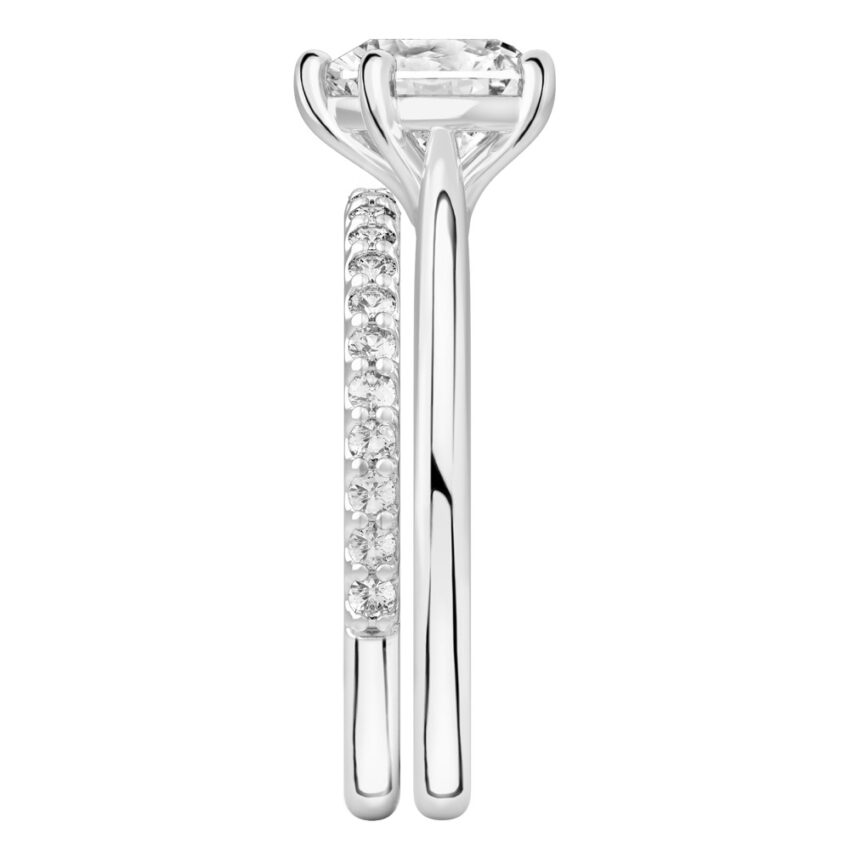 Side view of heart shape diamond cathedral solitaire engagement ring set palladium