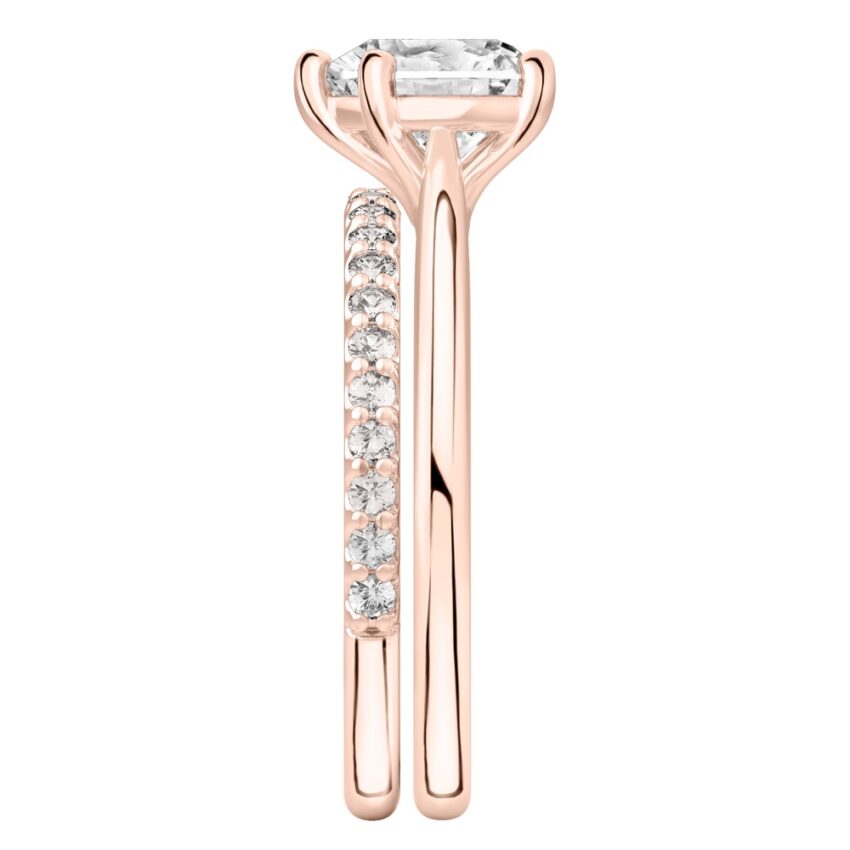 Side view of heart shape diamond cathedral solitaire engagement ring set rose gold