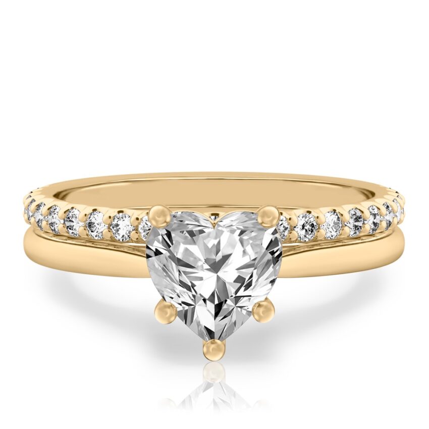 heart shape diamond cathedral solitaire engagement ring set in yellow gold