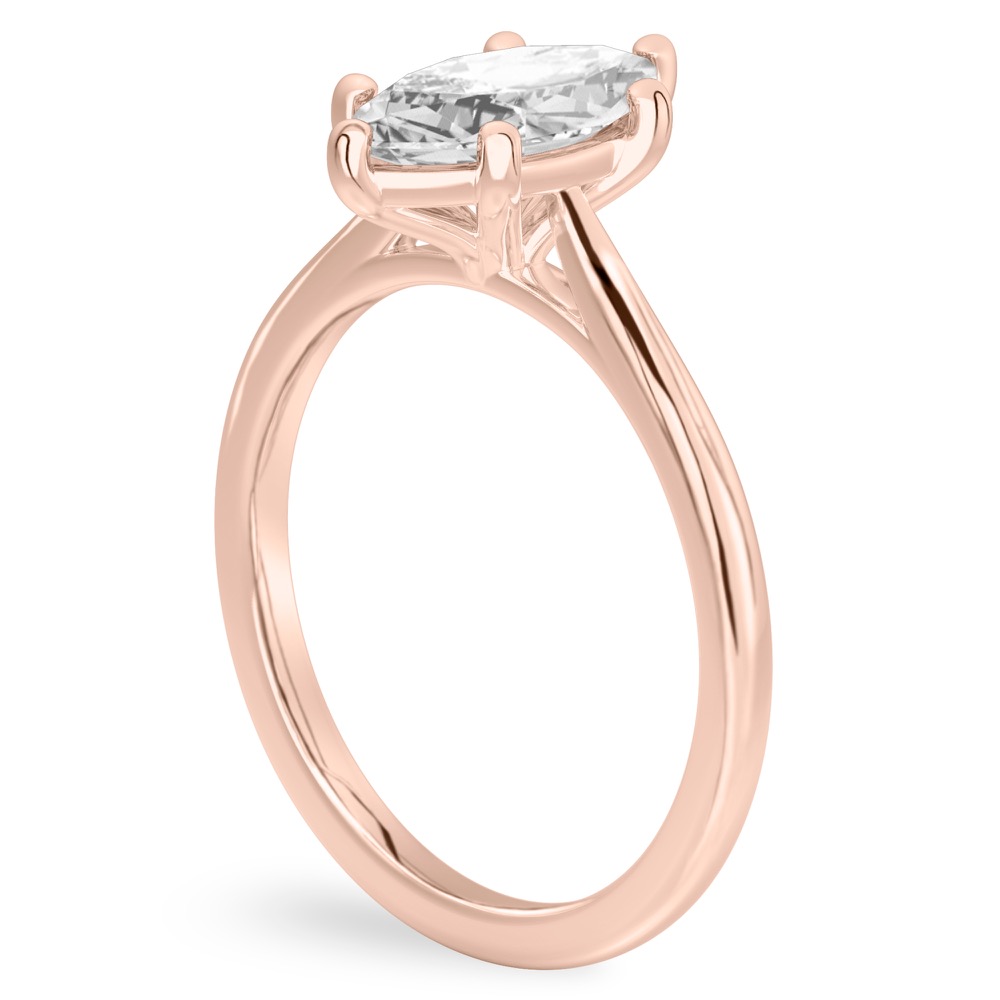 Angle view of marquise cut diamond cathedral solitaire engagement ring rose gold