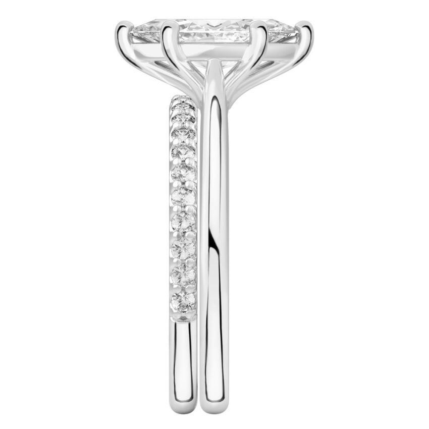 Side view of marquise cut diamond cathedral solitaire engagement ring set platinum
