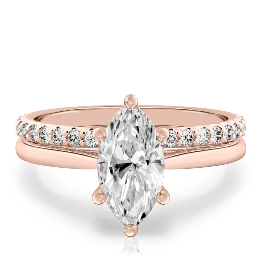 marquise cut diamond cathedral solitaire engagement ring set in rose gold
