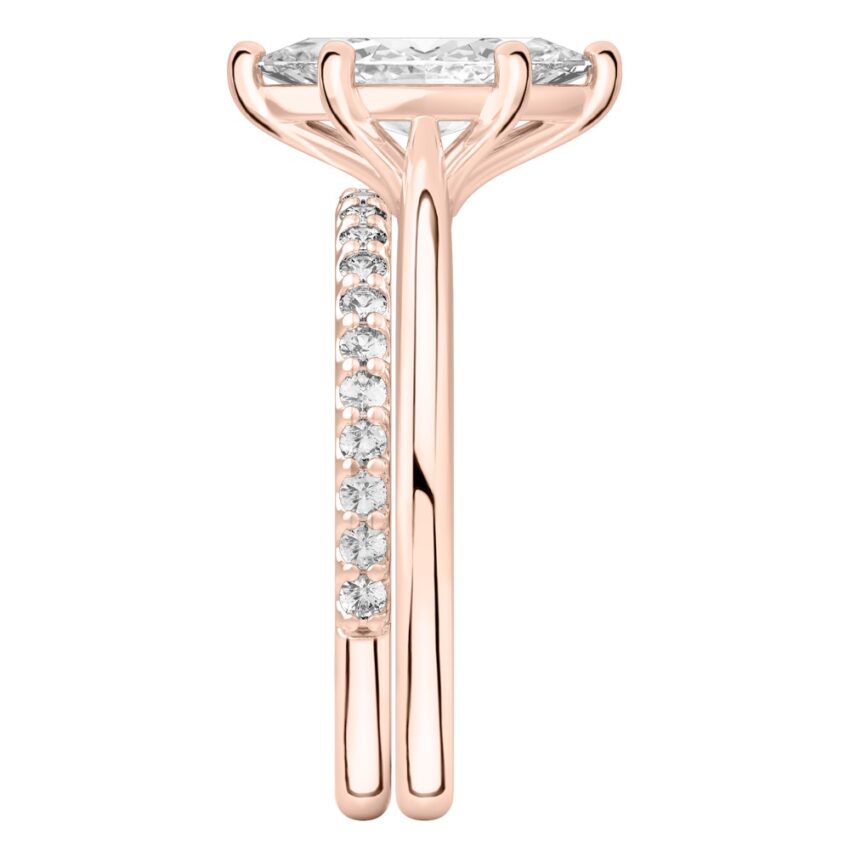 Side view of marquise cut diamond cathedral solitaire engagement ring set rose gold