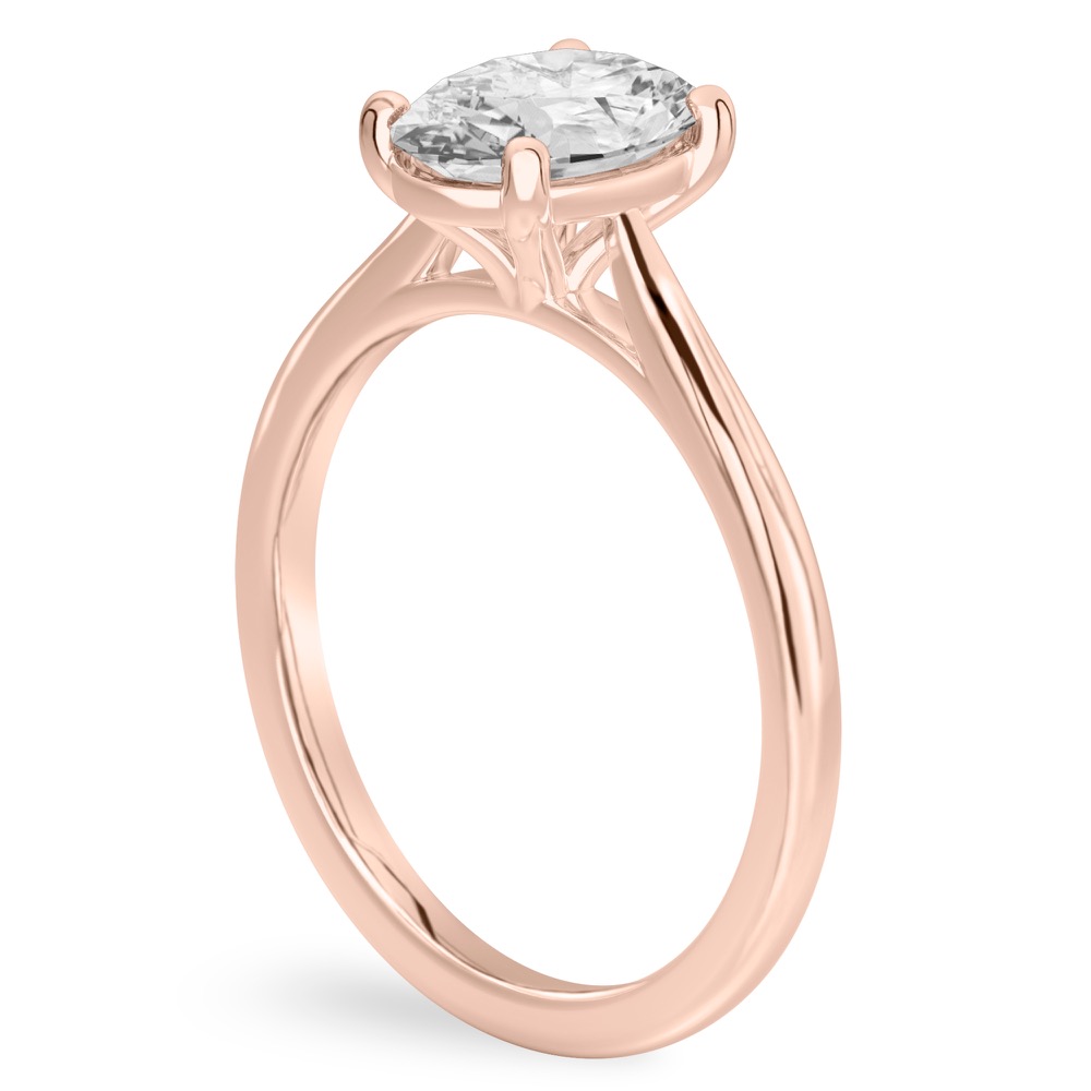 Angle view of oval shape diamond cathedral solitaire engagement ring rose gold