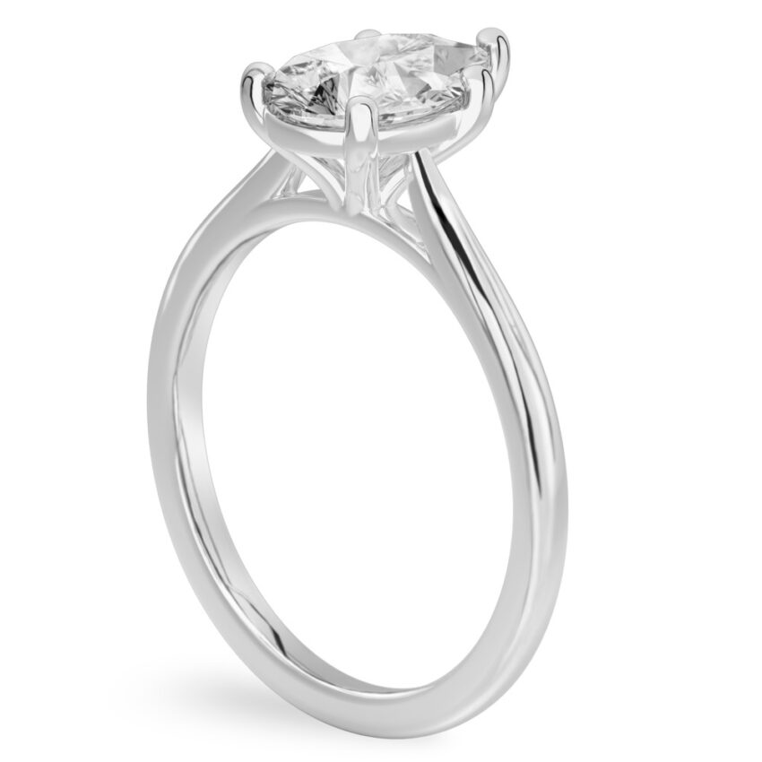 Angle view of pear shape diamond cathedral solitaire engagement ring platinum