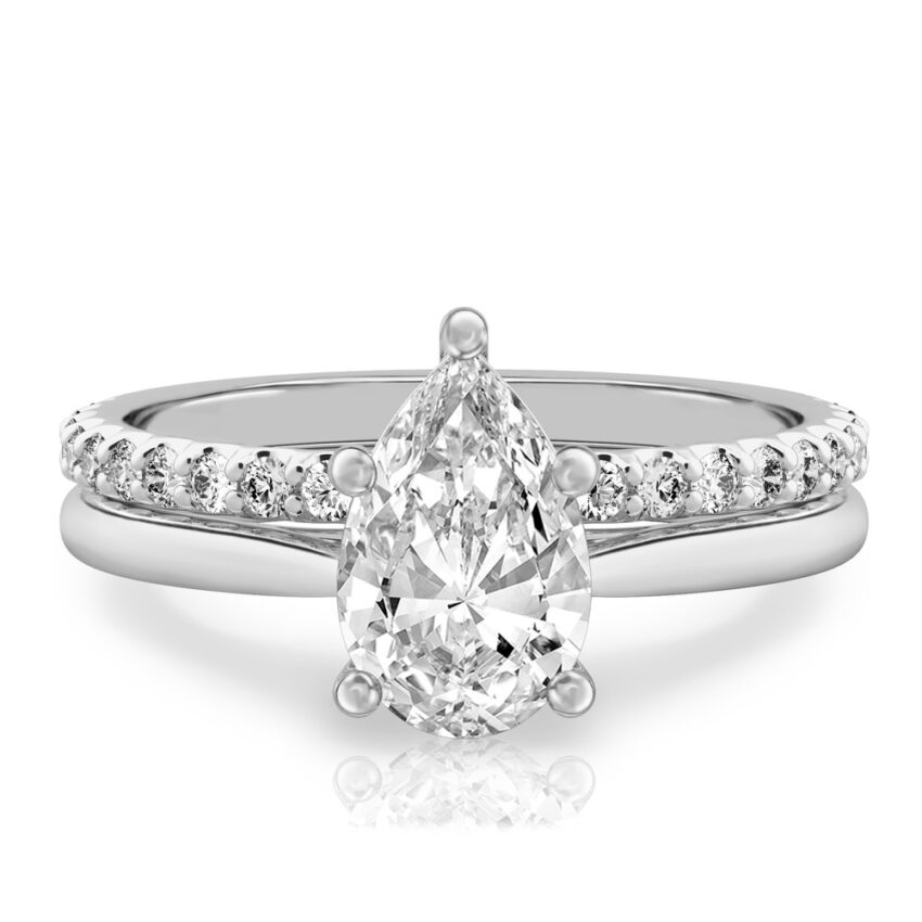 pear shape diamond cathedral solitaire engagement ring set in platinum