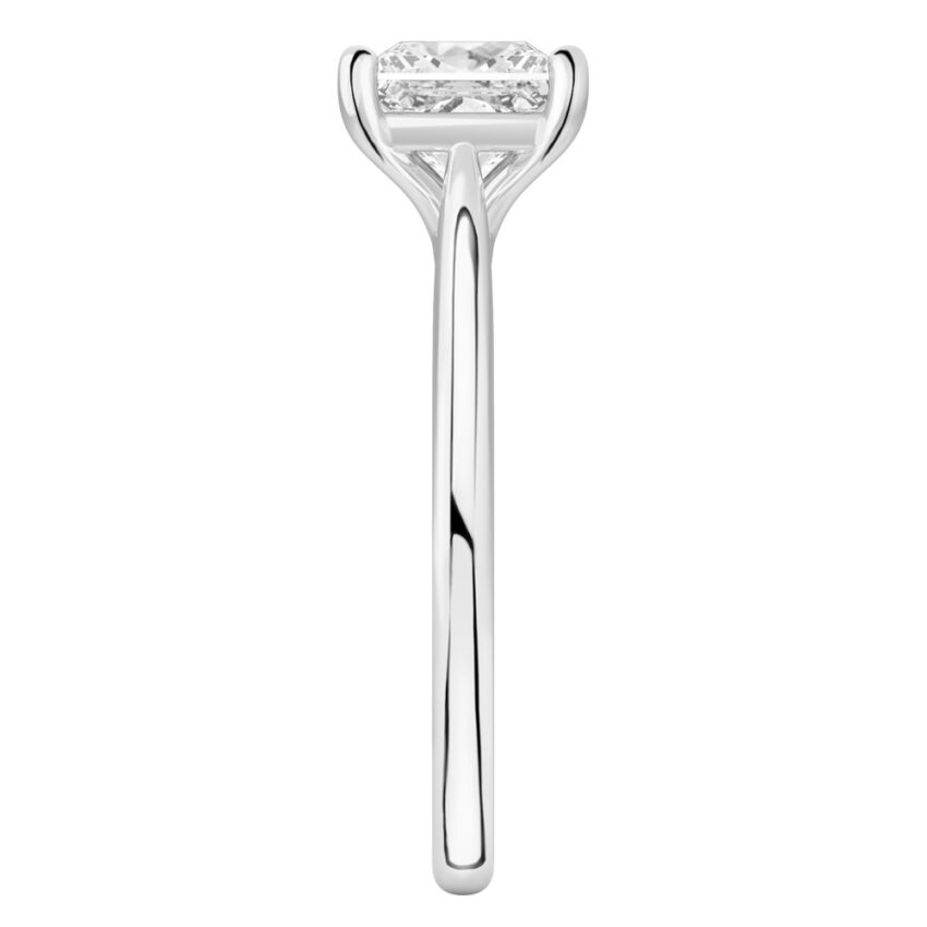 Side view of princess cut diamond cathedral solitaire engagement ring platinum