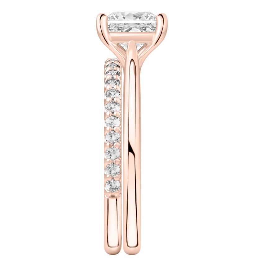 Side view of princess cut diamond cathedral solitaire engagement ring set rose gold