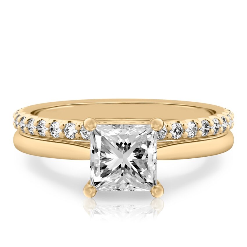 princess cut diamond cathedral solitaire engagement ring set in yellow gold