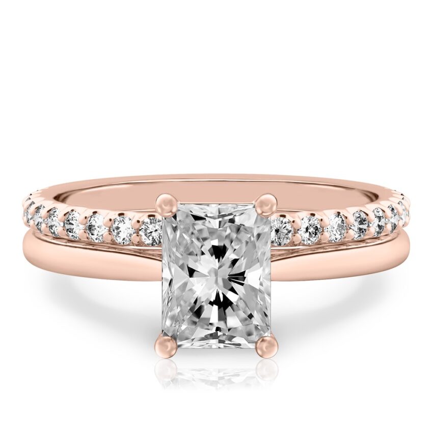 radiant cut diamond cathedral solitaire engagement ring set in rose gold