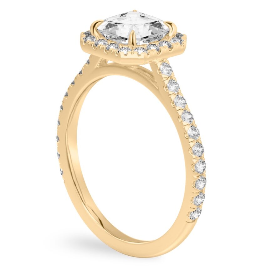 Angle view of asscher cut diamond cushion halo engagement ring yellow gold