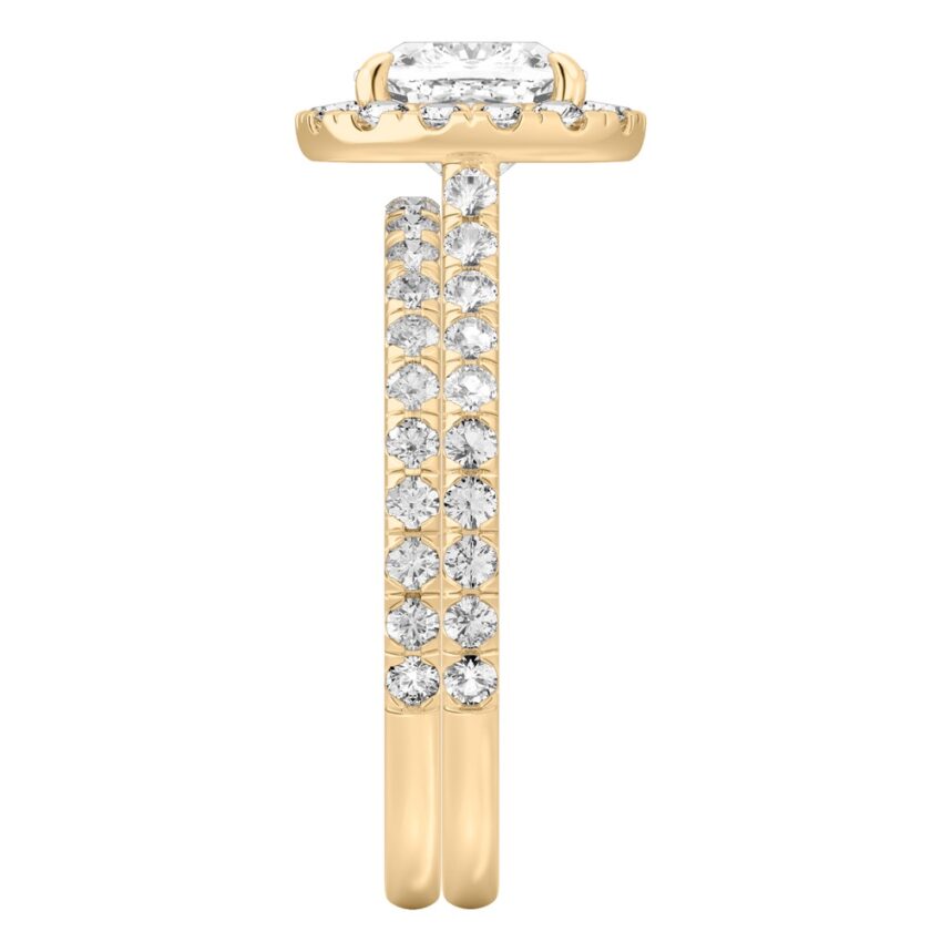 Side view of cushion cut diamond cushion halo engagement ring set yellow gold