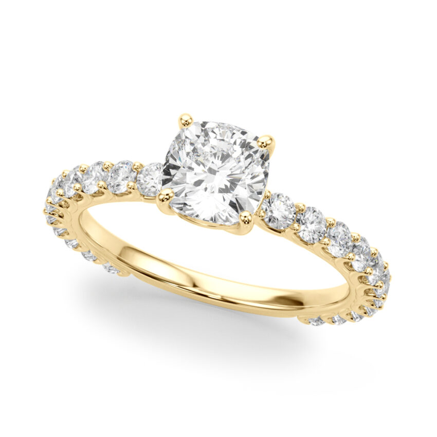 Angle view of cushion cut diamond engagement band with diamonds yellow gold