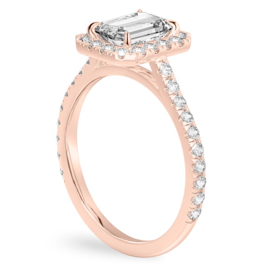 Angle view of emerald cut diamond cushion halo engagement ring rose gold
