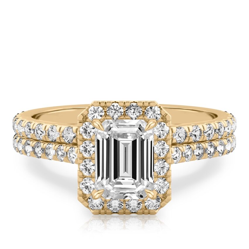 emerald cut diamond cushion halo engagement ring set in yellow gold