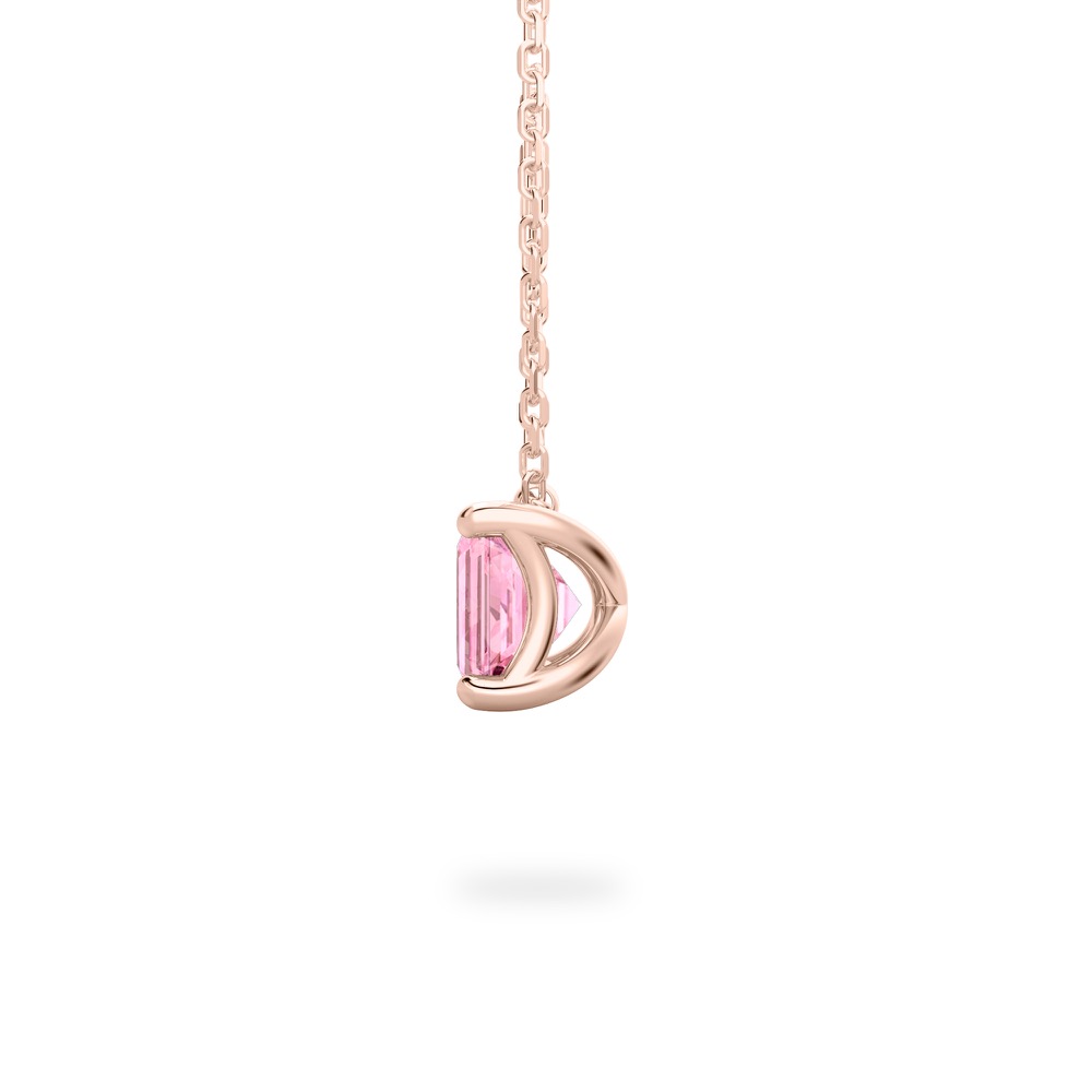 side view of emerald cut october birthstone necklace in rose gold