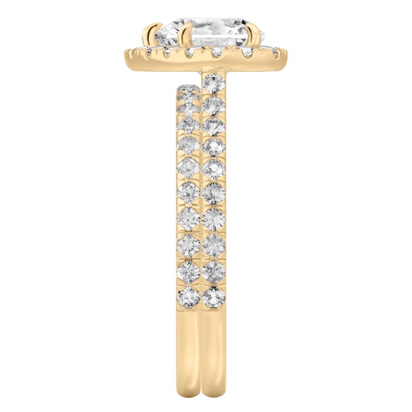 Side view of heart shape diamond cushion halo engagement ring set yellow gold