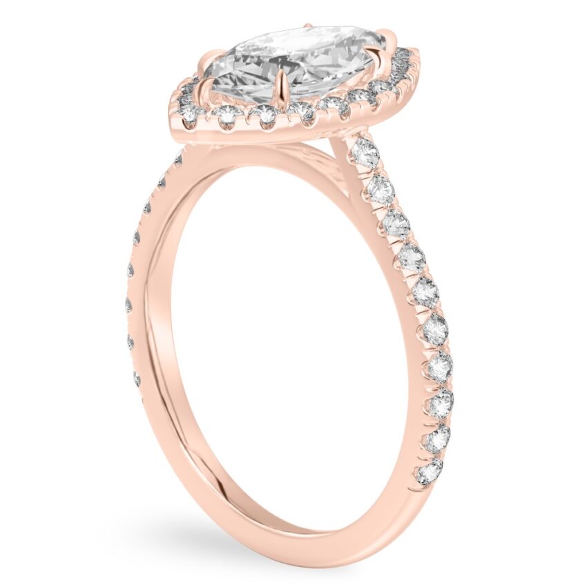 Angle view of marquise cut diamond cushion halo engagement ring rose gold