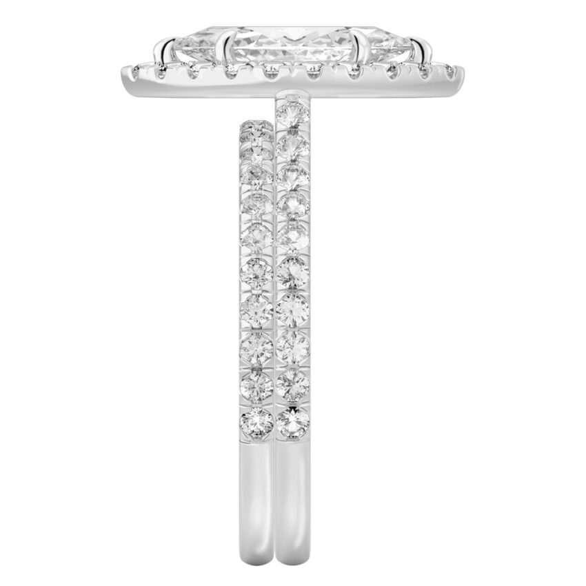 Side view of marquise cut diamond cushion halo engagement ring set platinum