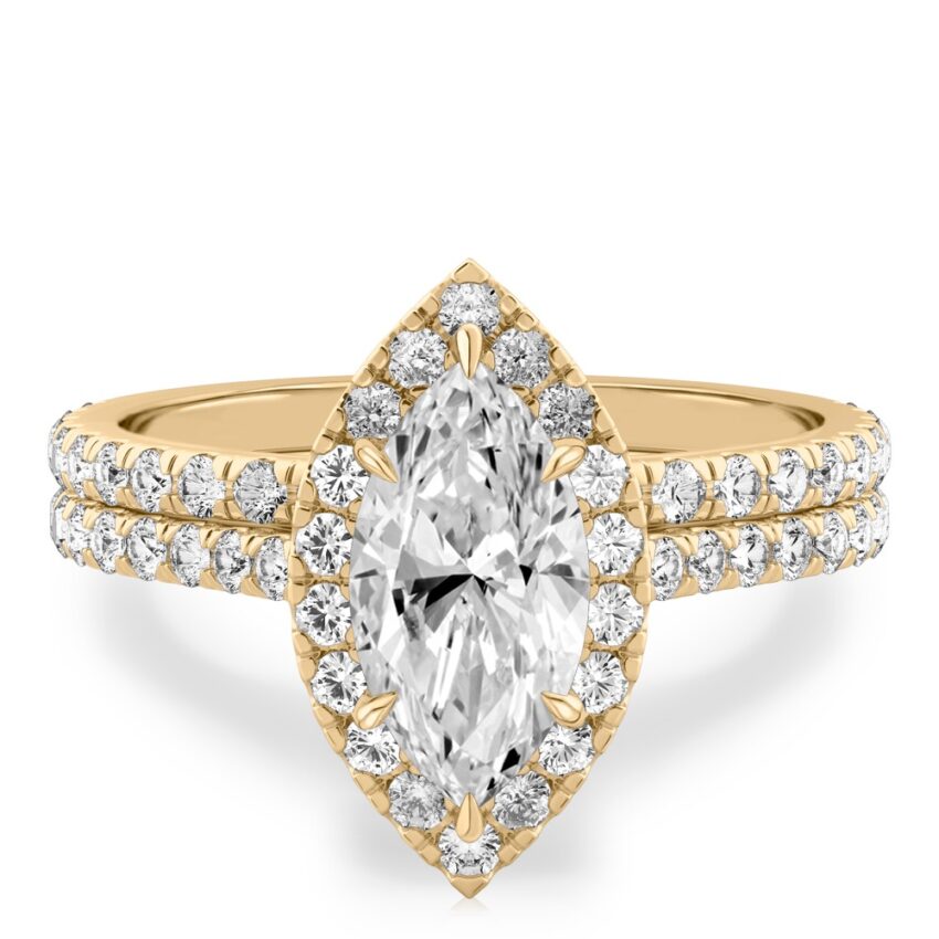 marquise cut diamond cushion halo engagement ring set in yellow gold