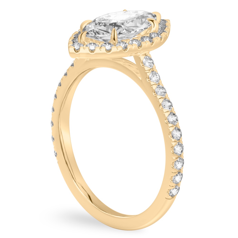 Angle view of marquise cut diamond cushion halo engagement ring yellow gold