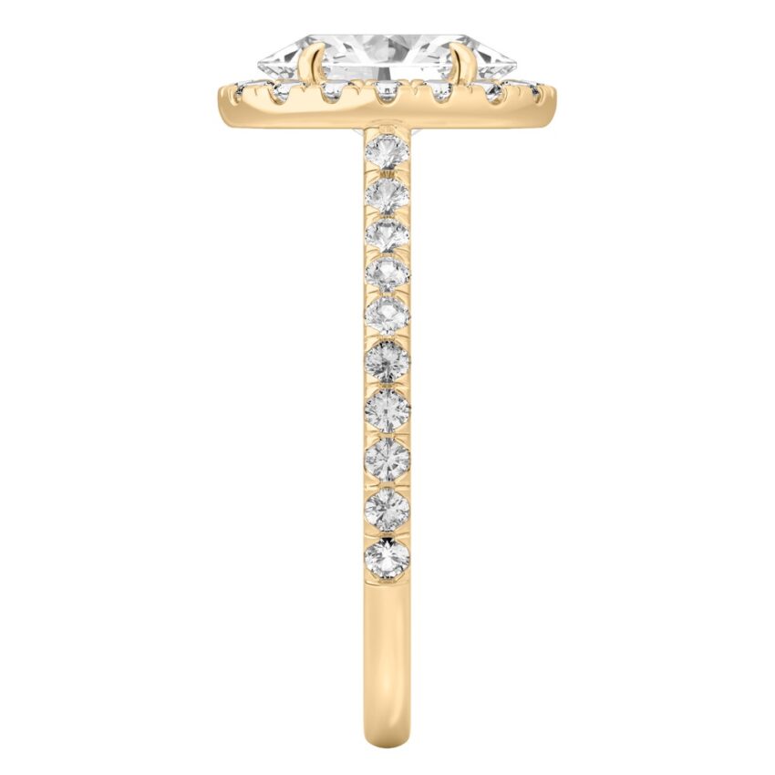 Side view of oval shape diamond cushion halo engagement ring yellow gold