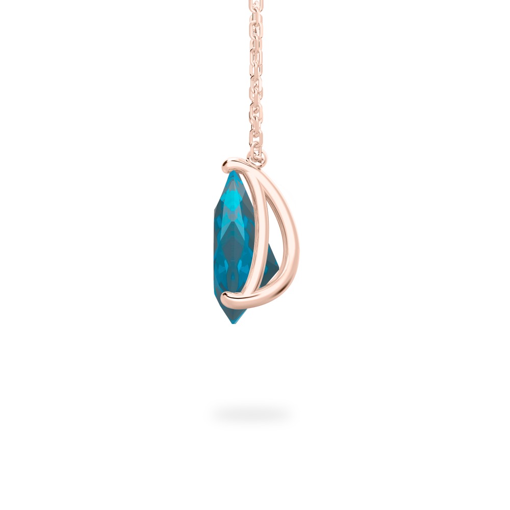 side view of pear shape december birthstone necklace in rose gold