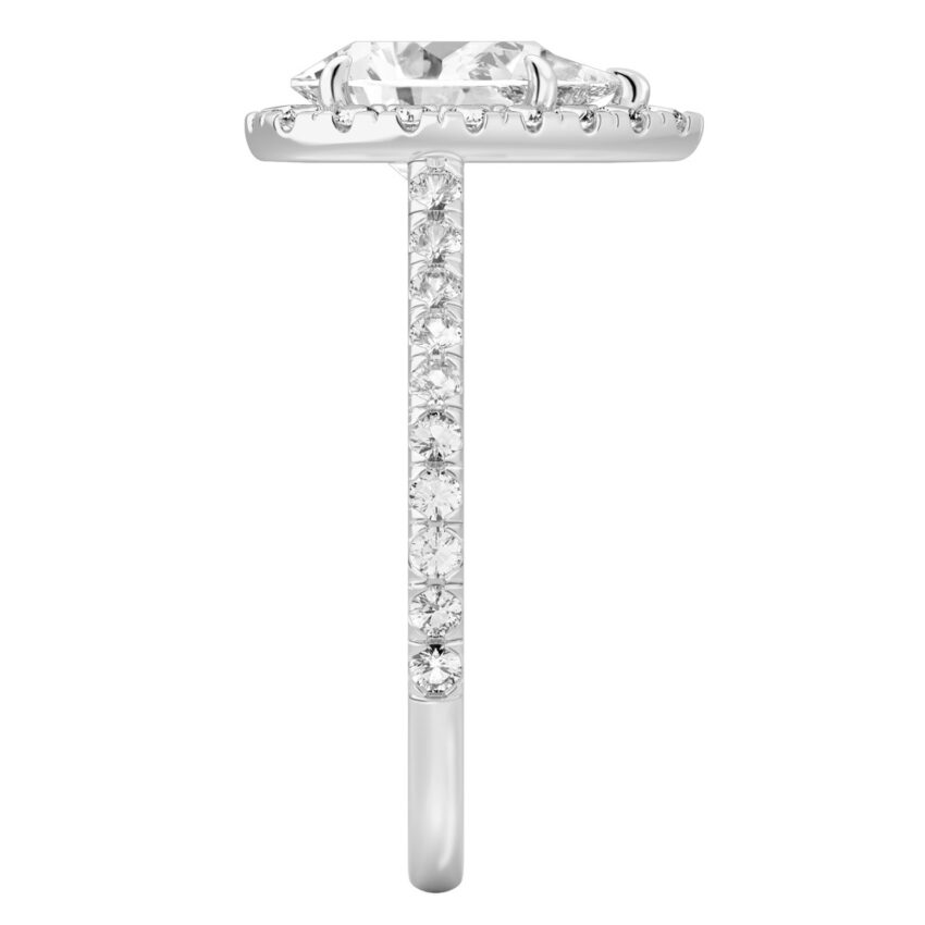 Side view of pear shape diamond cushion halo engagement ring platinum