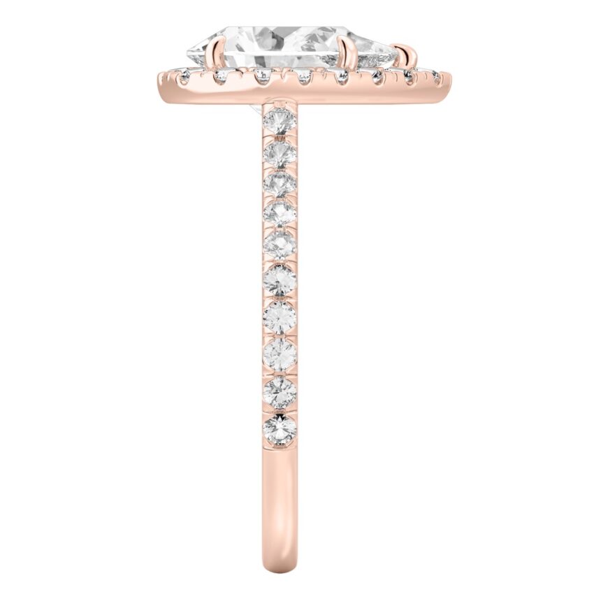 Side view of pear shape diamond cushion halo engagement ring rose gold