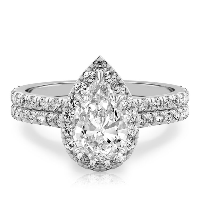 pear shape diamond cushion halo engagement ring set in platinum