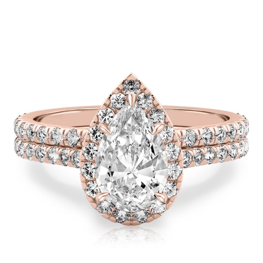 pear shape diamond cushion halo engagement ring set in rose gold