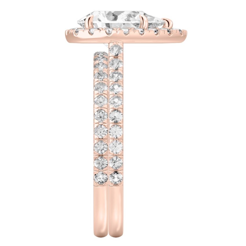 Side view of pear shape diamond cushion halo engagement ring set rose gold