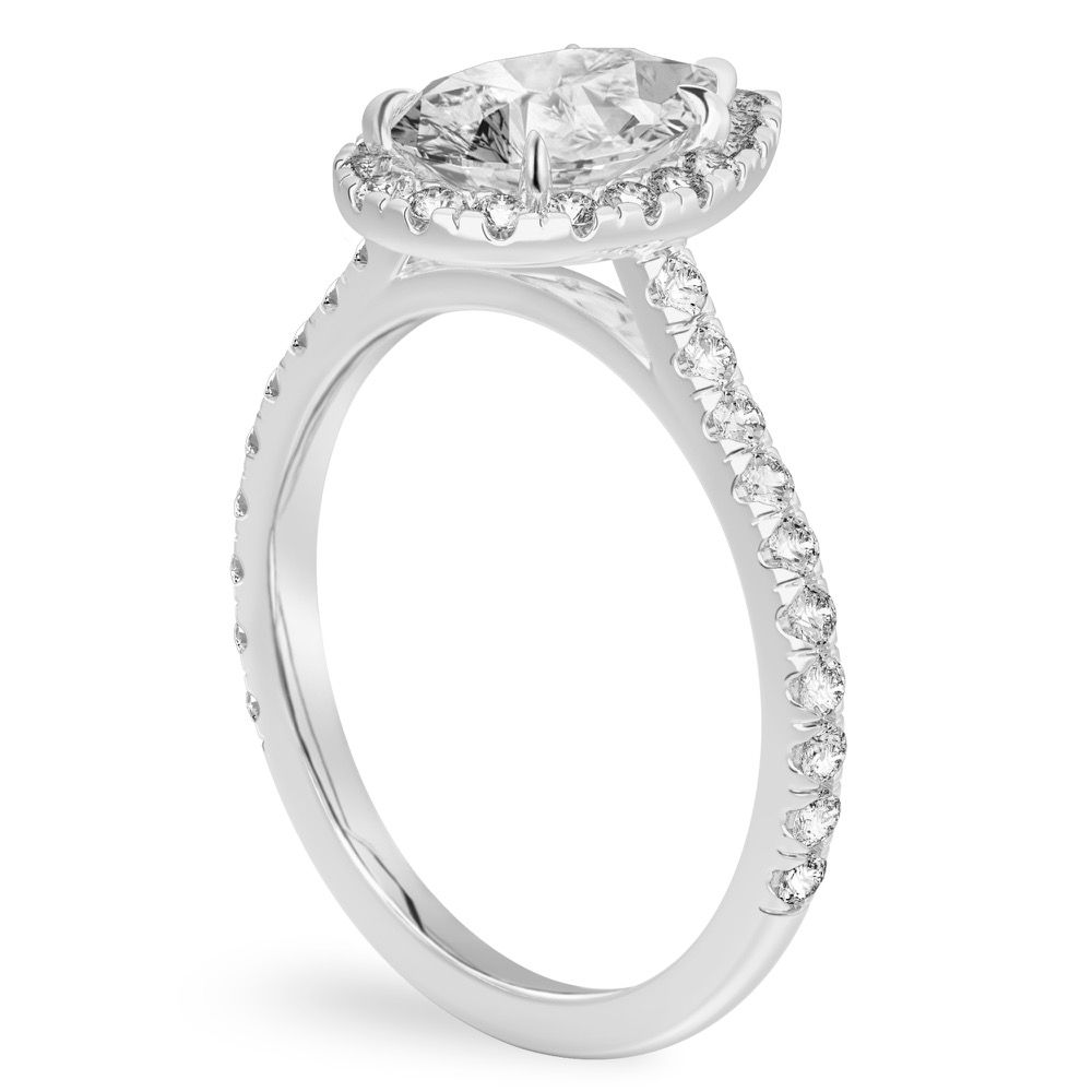 Angle view of pear shape diamond cushion halo engagement ring white gold