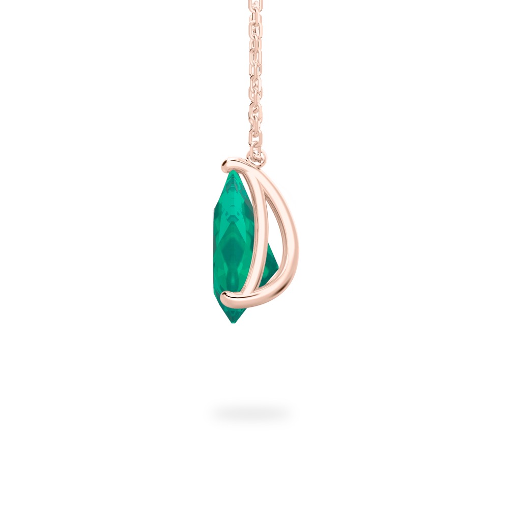 side view of pear shape emerald necklace in rose gold