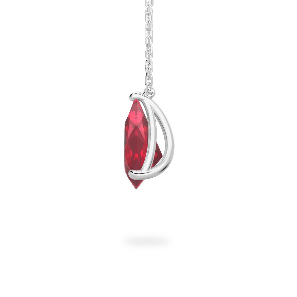 side view of pear shape ruby necklace in platinum