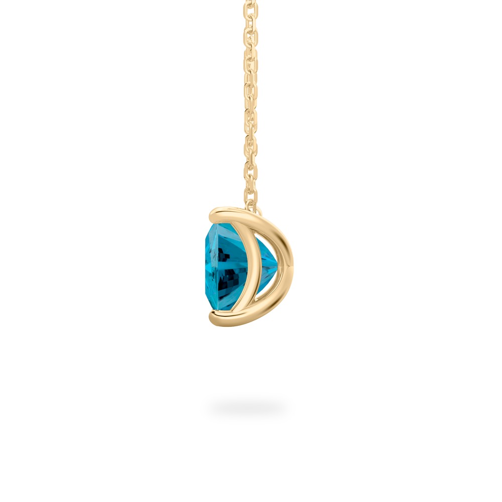 side view of princess cut december birthstone necklace in yellow gold