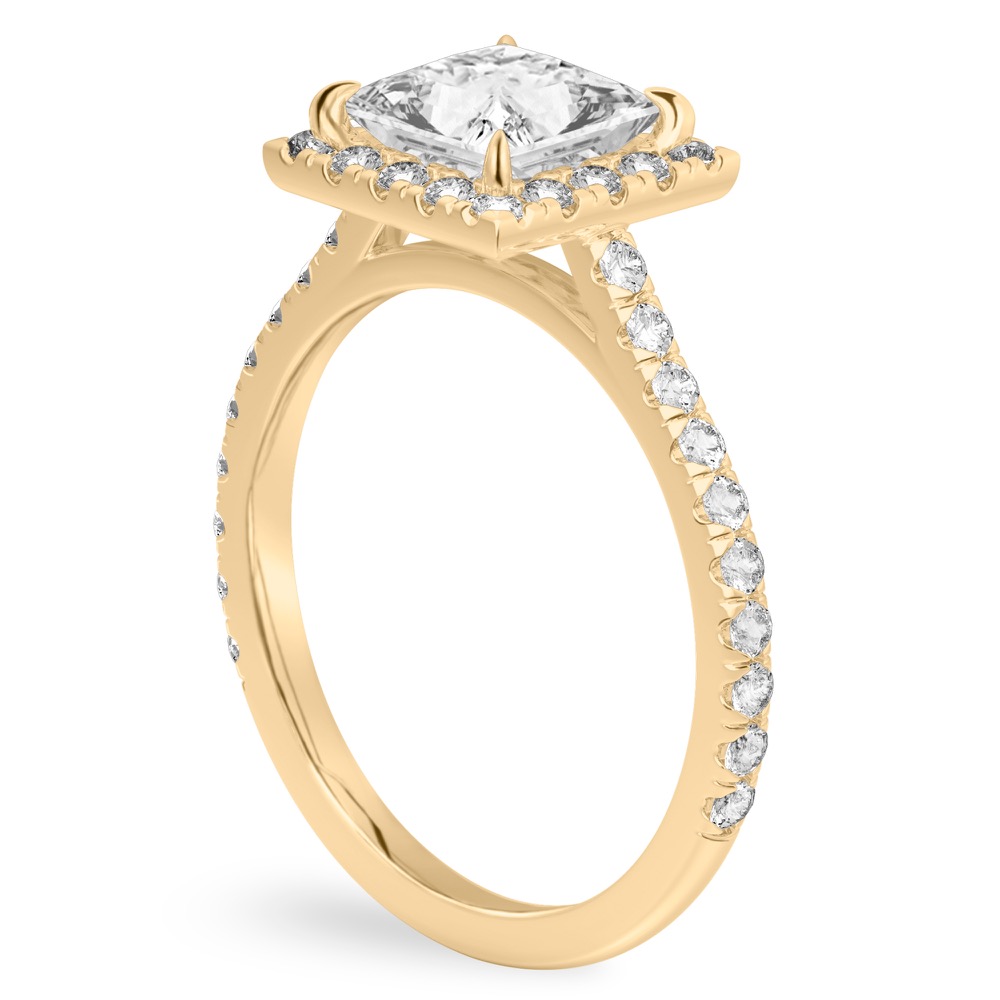 Angle view of princess cut diamond cushion halo engagement ring yellow gold