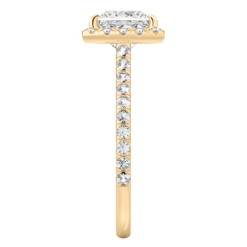 Side view of princess cut diamond cushion halo engagement ring yellow gold