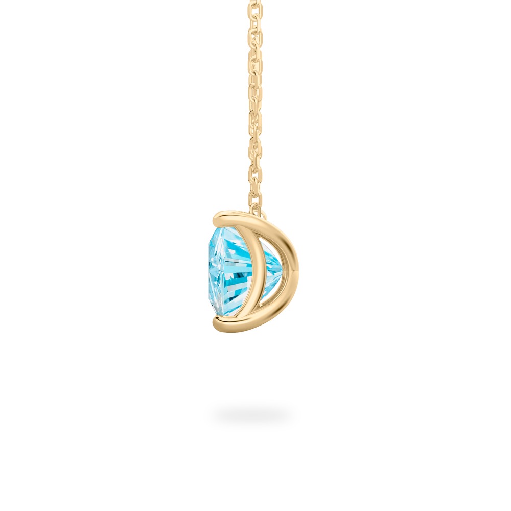 side view of princess cut march birthstone necklace in yellow gold