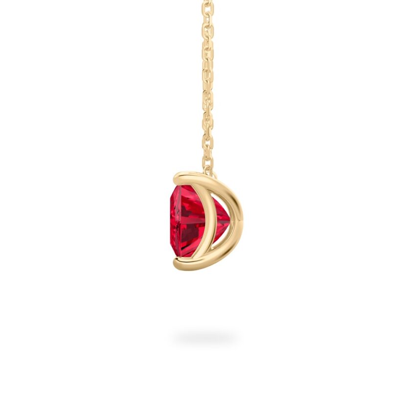 side view of princess cut ruby necklace in yellow gold
