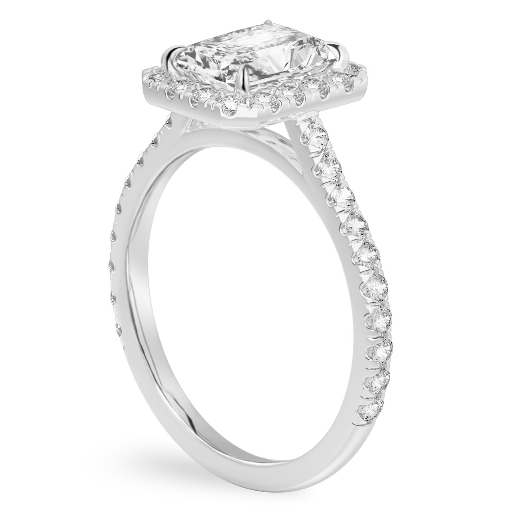 Angle view of radiant cut diamond cushion halo engagement ring platinum