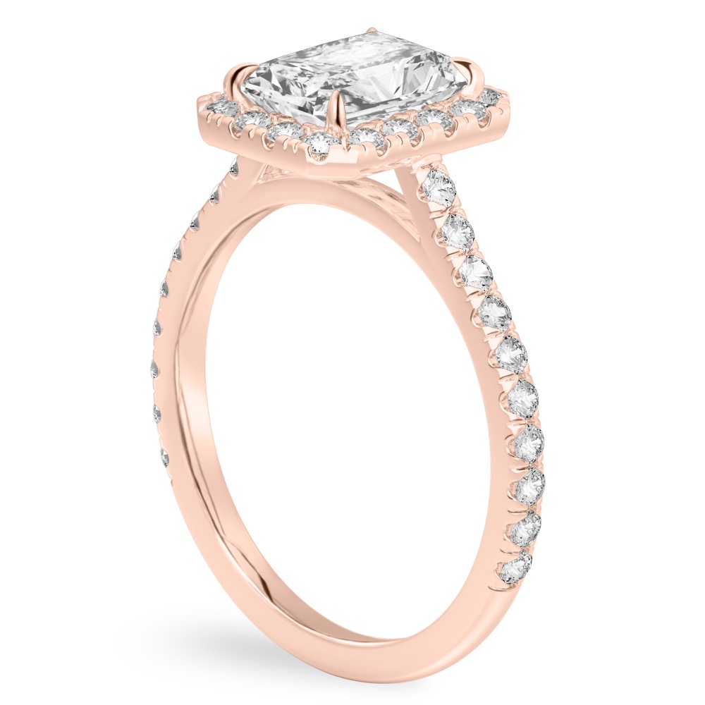 Angle view of radiant cut diamond cushion halo engagement ring rose gold