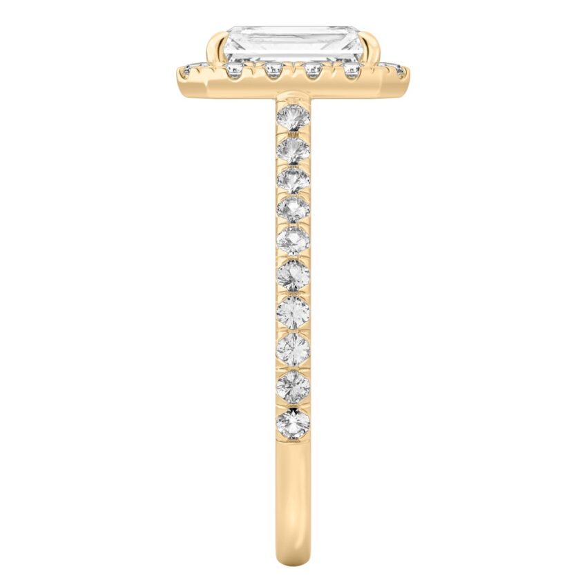 Side view of radiant cut diamond cushion halo engagement ring yellow gold