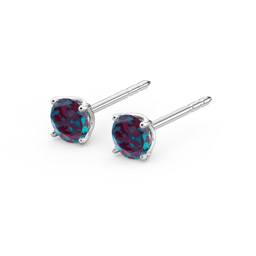 angle view of alexandrite earrings in white gold with round cut gemstone