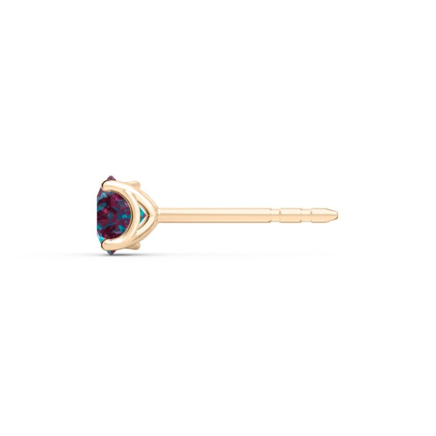 side view of alexandrite earrings in yellow gold with round cut gemstone