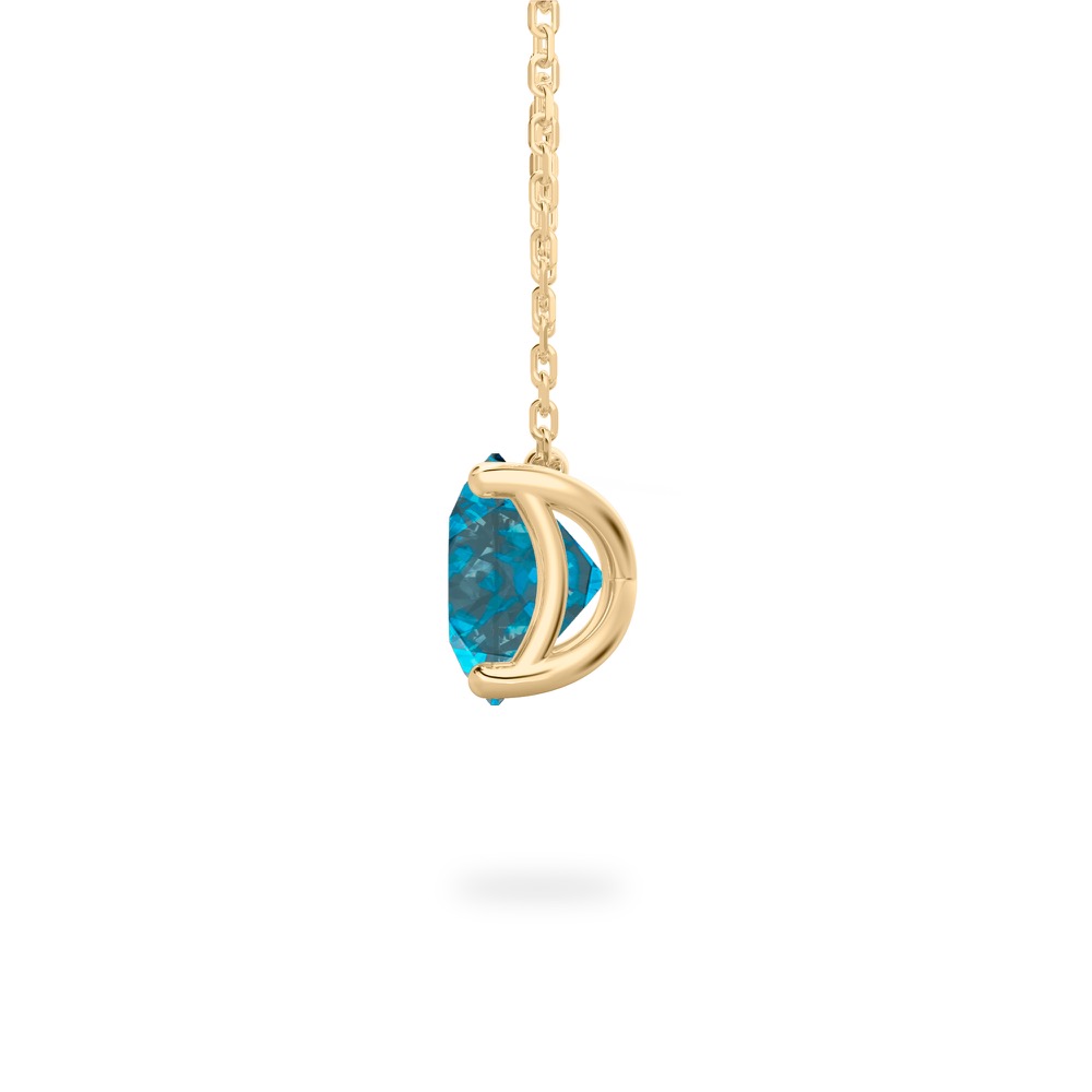 side view of round cut december birthstone necklace in yellow gold