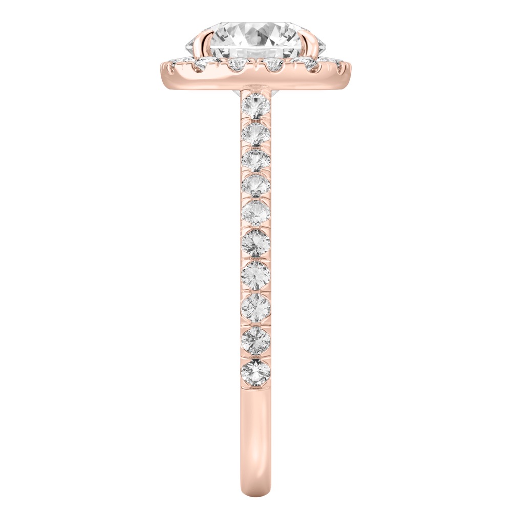 Side view of round cut diamond cushion halo engagement ring rose gold