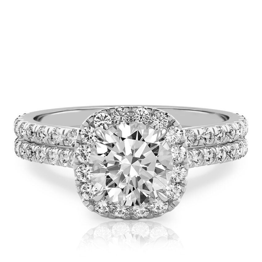 round cut diamond cushion halo engagement ring set in platinum